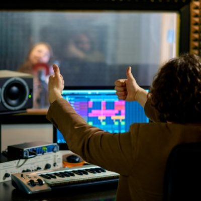 male-musician-and-female-singer-recording-studio-2023-11-27-05-32-28-utc (Small)